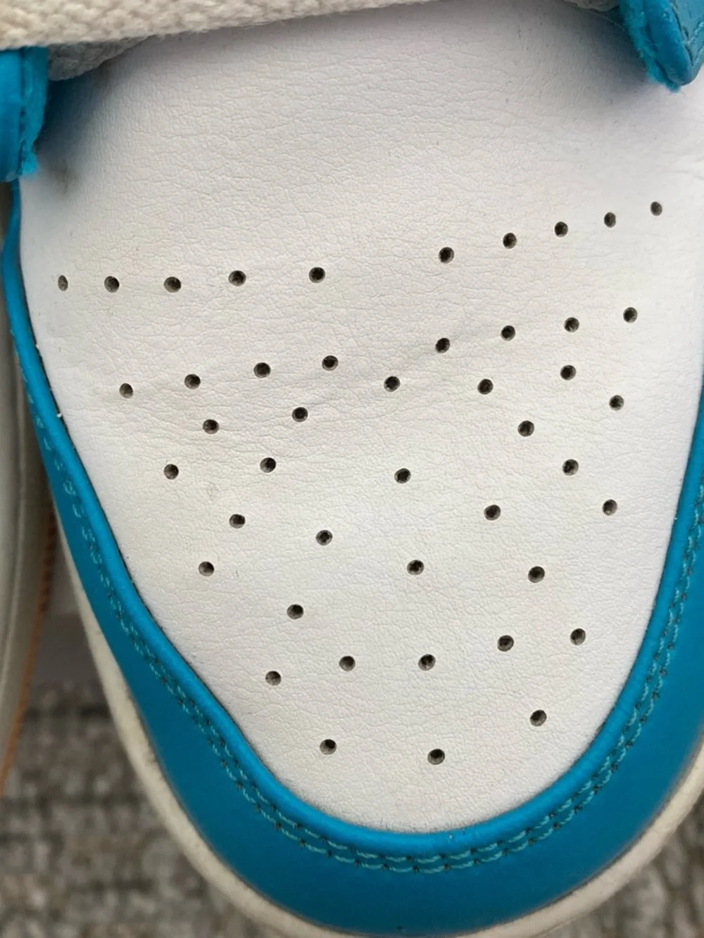 Jordan Air Jordan 1 Mid White and Teal Basketball Sneakers